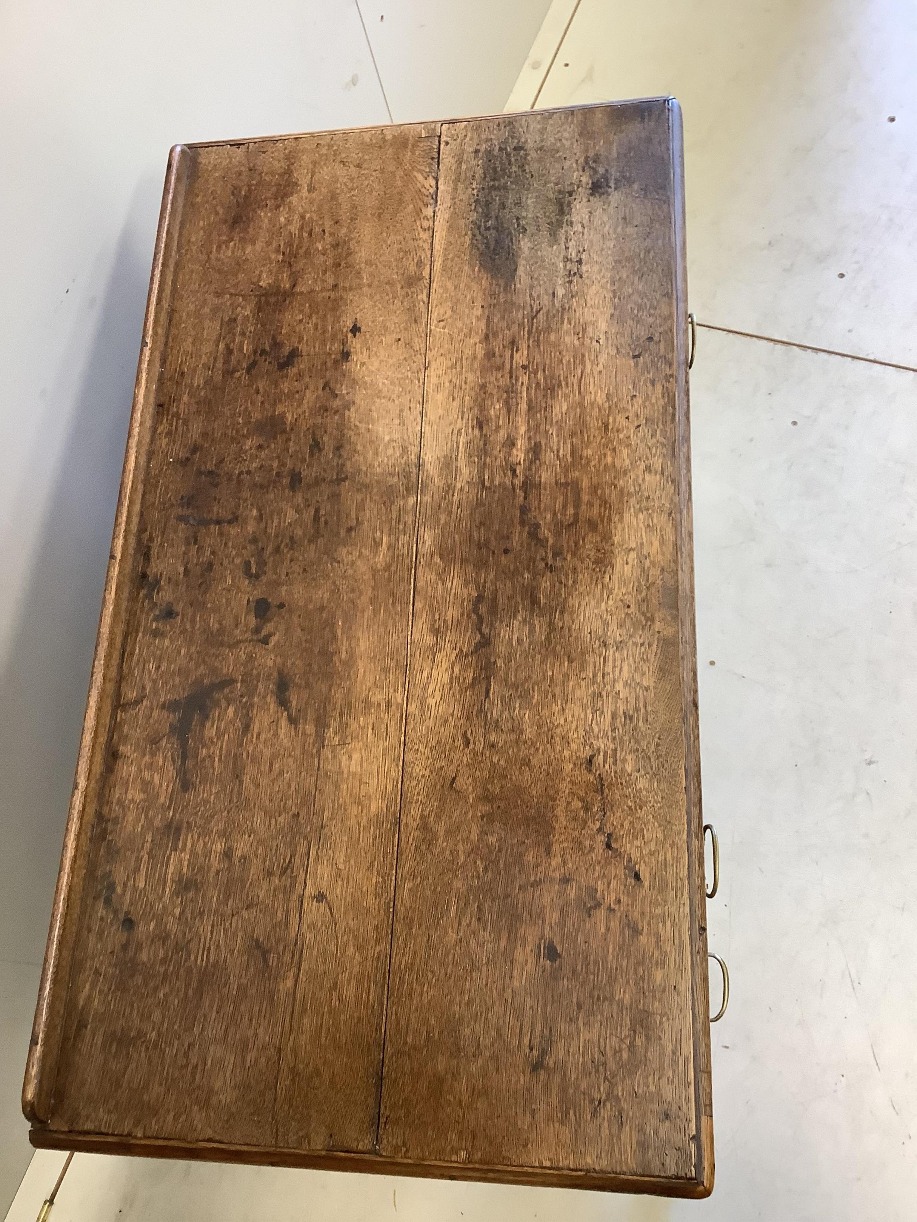 A George lll Provincial oak kneehole desk, width 86cm, depth 46cm, height 78cm. Condition - fair